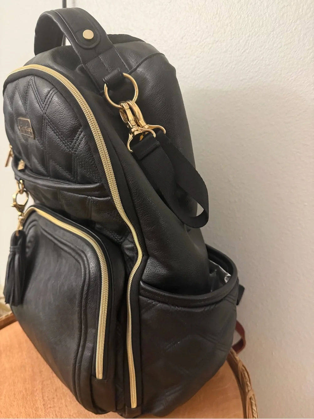 Itzy Ritzy Black Quilted Backpack with Gold Hardware